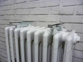Supports GM pour tablette installés sur radiateur fonte Merveille Ledin